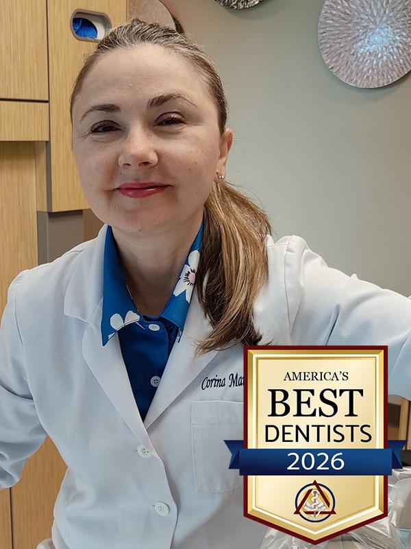 Dr Photo with Best Dentist Award