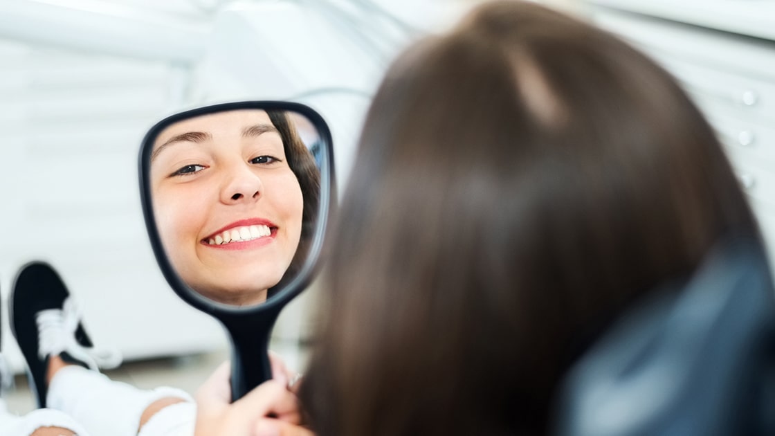 Woman admiring her smile